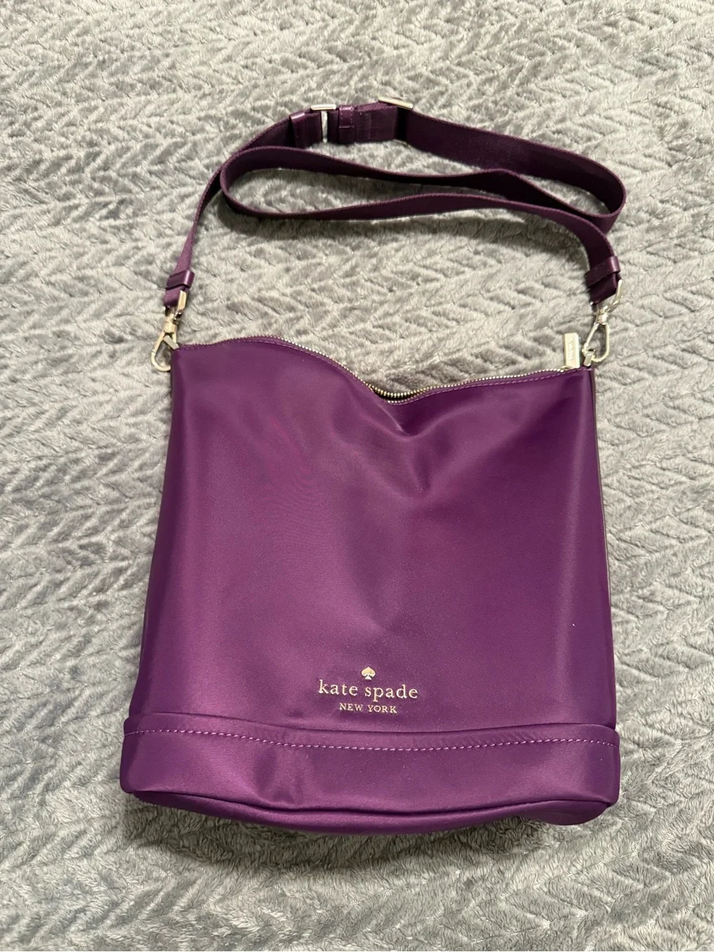 kate spade purple leather crossbody bag with gold logo